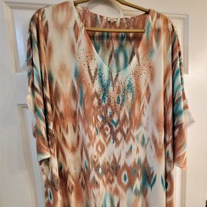 Designer tunic with fringe
